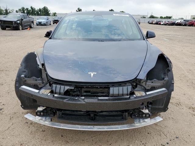 Photo 5 from auction – 2021 TESLA MODEL 3 with VIN 5YJ3E1EA3MF028453