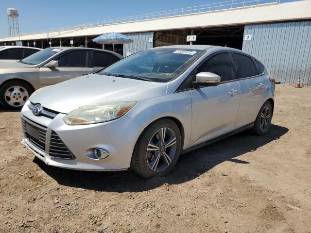 FORD FOCUS SE 2014 with VIN 1FADP3K21EL374819 - Photo from auction
