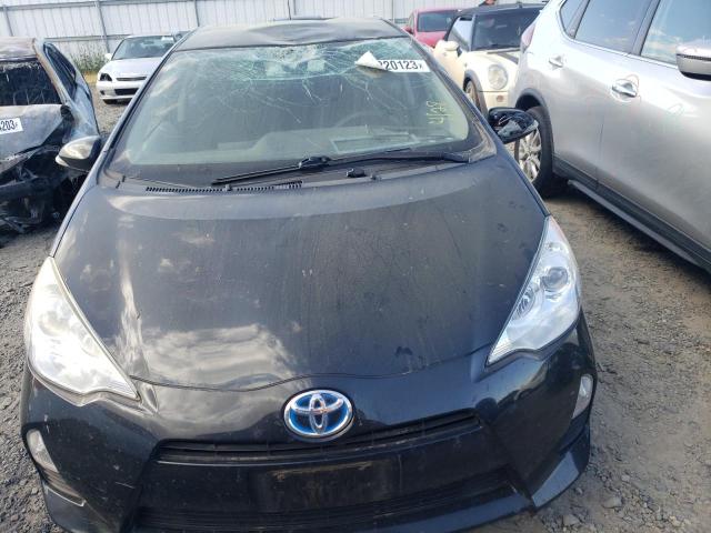Photo 5 from auction – 2014 TOYOTA PRIUS C with VIN JTDKDTB37E1559309