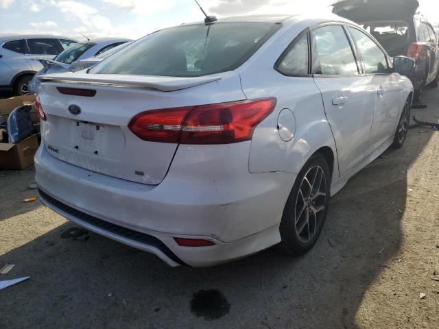 Photo 3 from auction – 2016 FORD FOCUS SE with VIN 1FADP3F21GL238669
