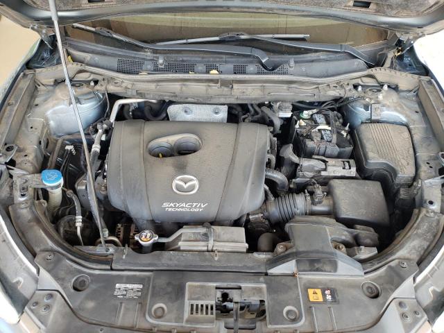 Photo 11 from auction – 2015 MAZDA CX-5 GT with VIN JM3KE2DY5F0469462