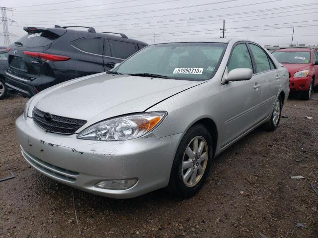 TOYOTA CAMRY LE 2003 with VIN 4T1BF30K63U546644 - Photo from auction