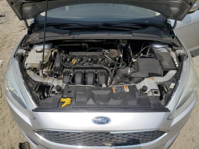 Photo 11 from auction – 2015 FORD FOCUS SE with VIN 1FADP3F20FL252609