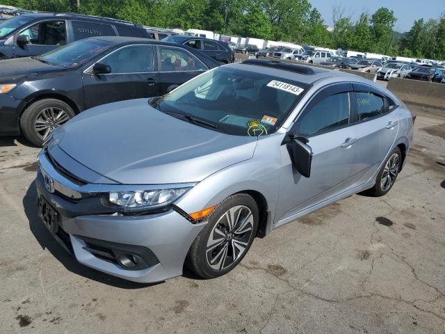 HONDA CIVIC EXL 2017 with VIN 2HGFC1F77HH648052 - Photo from auction