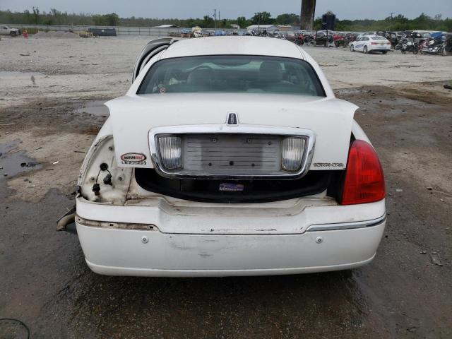 Photo 6 from auction – 2004 LINCOLN TOWN CAR E with VIN 1LNHM81W44Y629949