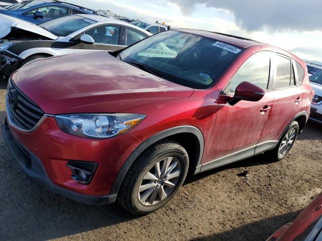 MAZDA CX-5 TOURI 2016 with VIN JM3KE4CY8G0801974 - Photo from auction