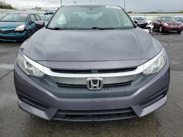 Photo 5 from auction – 2018 HONDA CIVIC LX with VIN 2HGFC2F59JH594165
