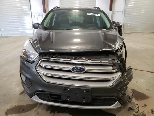 Photo 5 from auction – 2018 FORD ESCAPE SE with VIN 1FMCU0GD0JUC13904