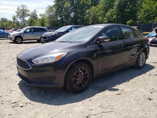 FORD FOCUS SE 2015 with VIN 1FADP3F23FL303861 - Photo from auction