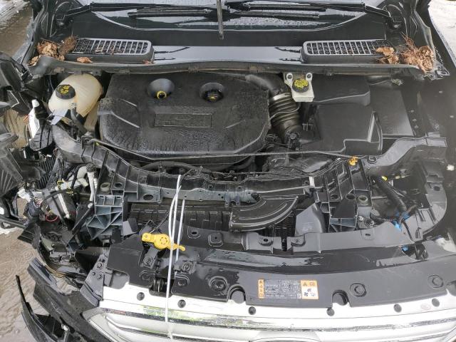 Photo 12 from auction – 2018 FORD ESCAPE TIT with VIN 1FMCU9J96JUA36008
