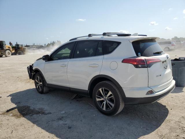 Photo 2 from auction – 2017 TOYOTA RAV4 XLE with VIN JTMWFREV9HJ102422