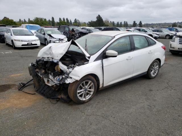 FORD FOCUS SE 2018 with VIN 1FADP3F23JL207026 - Photo from auction