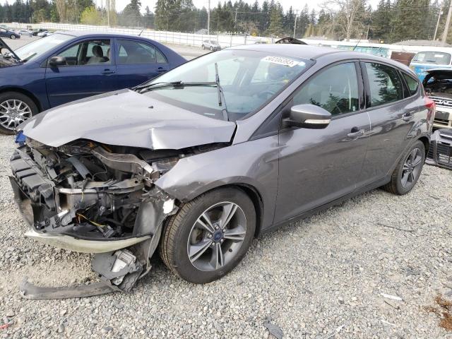 FORD FOCUS SE 2014 with VIN 1FADP3K21EL199973 - Photo from auction