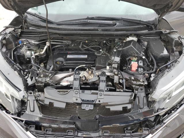 Photo 11 from auction – 2015 HONDA CR-V LX with VIN 5J6RM4H30FL110422