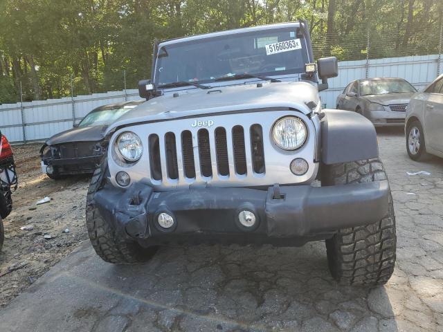 Photo 5 from auction – 2016 JEEP WRANGLER U with VIN 1C4BJWDG3GL266010
