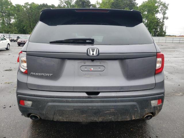 Photo 6 from auction – 2021 HONDA PASSPORT E with VIN 5FNYF7H54MB006384