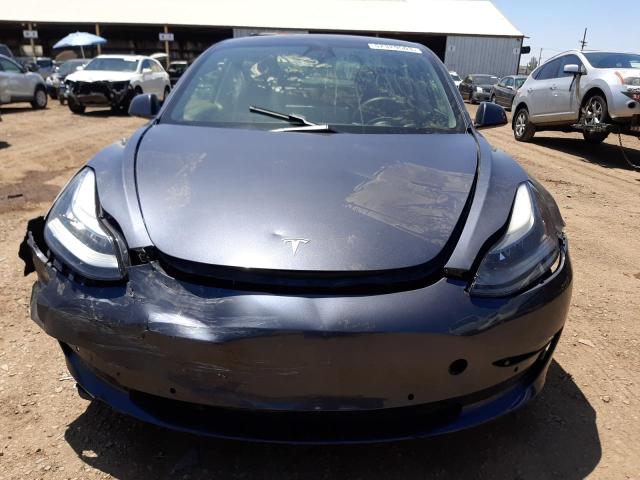 Photo 5 from auction – 2021 TESLA MODEL 3 with VIN 5YJ3E1EA0MF875981