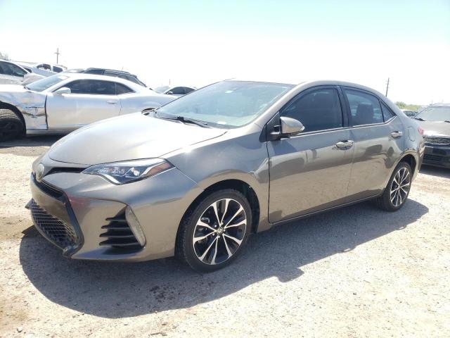 TOYOTA COROLLA L 2017 with VIN 2T1BURHE5HC810064 - Photo from auction