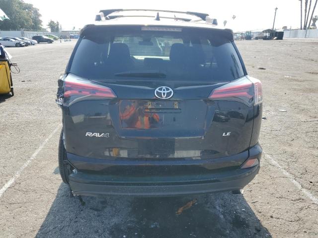 Photo 6 from auction – 2018 TOYOTA RAV4 LE with VIN 2T3ZFREV2JW490727