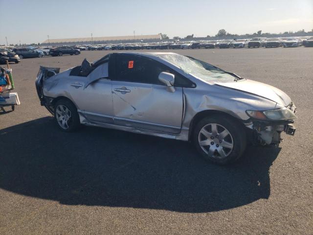 Photo 4 from auction – 2010 HONDA CIVIC LX with VIN 19XFA1F5XAE077239