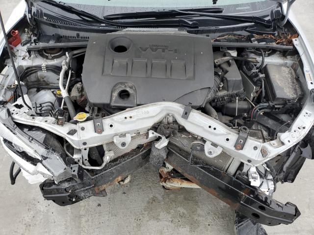 Photo 11 from auction – 2014 TOYOTA COROLLA L with VIN 2T1BURHE5EC052058
