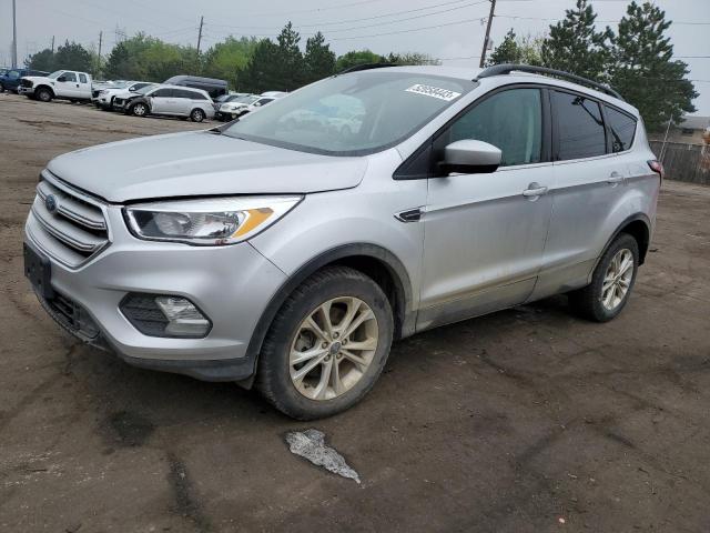 FORD ESCAPE SE 2018 with VIN 1FMCU9GD3JUC88603 - Photo from auction
