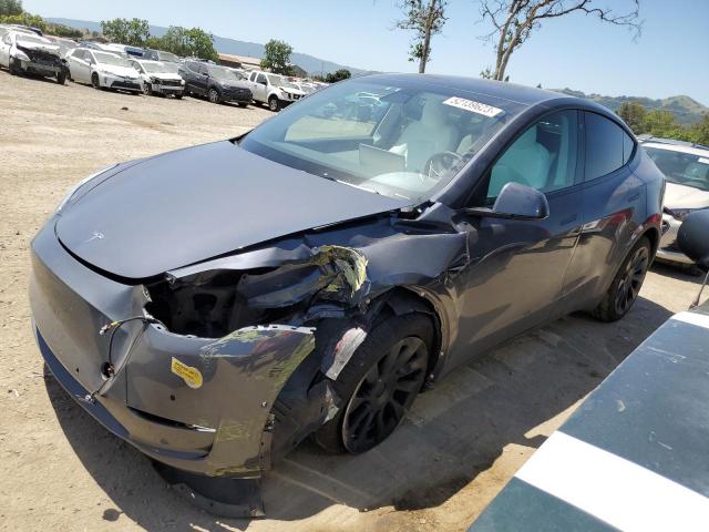 TESLA MODEL Y 2022 with VIN 7SAYGDEE4NF341049 - Photo from auction