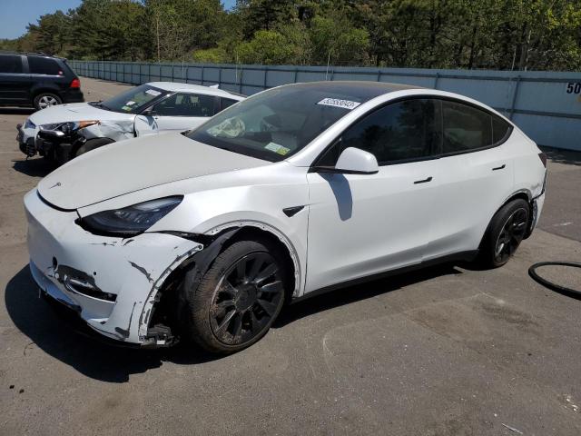 TESLA MODEL Y 2022 with VIN 7SAYGAEE9NF309762 - Photo from auction