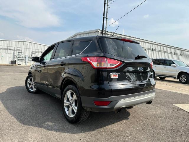 Photo 3 from auction – 2014 FORD ESCAPE SE with VIN 1FMCU0GX6EUE10494