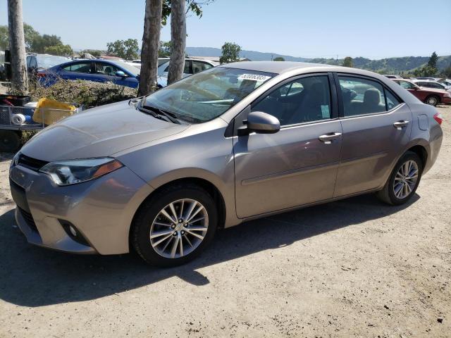 TOYOTA COROLLA L 2014 with VIN 5YFBURHE4EP037650 - Photo from auction