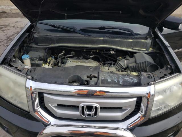 Photo 12 from auction – 2011 HONDA PILOT TOUR with VIN 5FNYF4H99BB014348