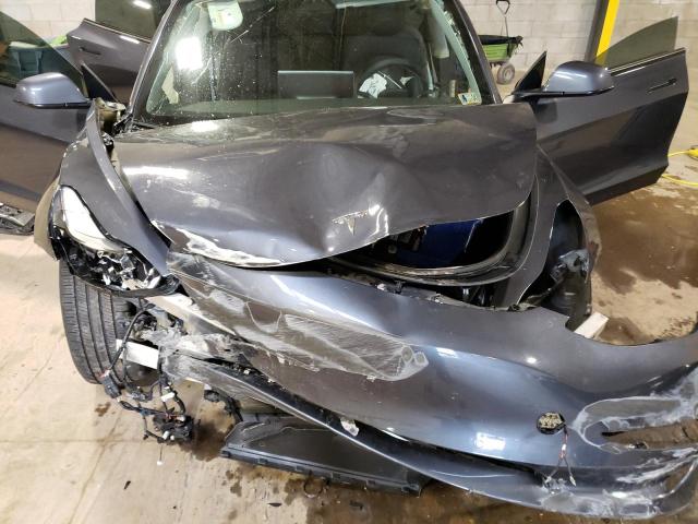 Photo 11 from auction – 2022 TESLA MODEL 3 with VIN 5YJ3E1EB8NF121642