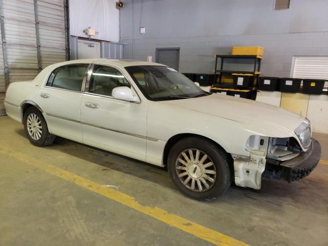 Photo 4 from auction – 2004 LINCOLN TOWN CAR U with VIN 1LNHM83W74Y674008