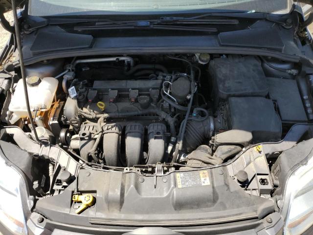 Photo 11 from auction – 2014 FORD FOCUS SE with VIN 1FADP3F20EL320325