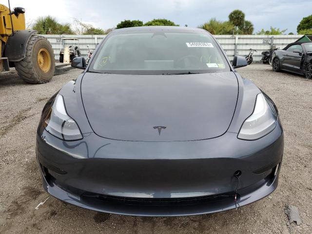 Photo 5 from auction – 2022 TESLA MODEL 3 with VIN 5YJ3E1EC9NF318053