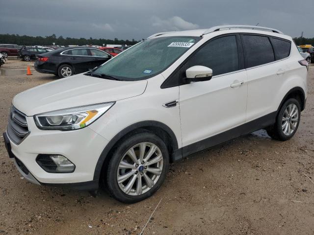 FORD ESCAPE TIT 2017 with VIN 1FMCU0JD0HUB42450 - Photo from auction
