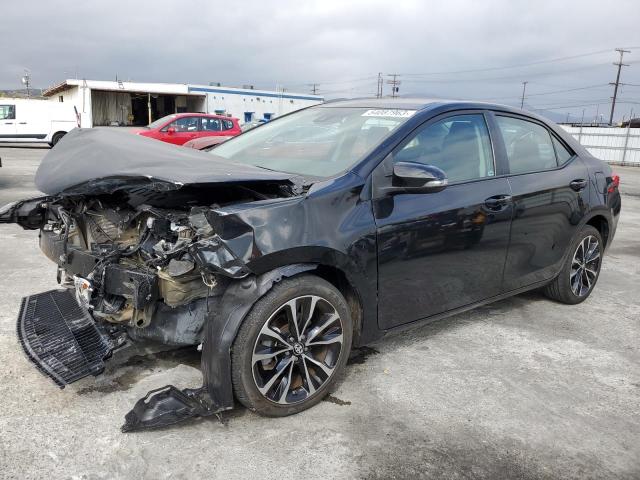 TOYOTA COROLLA L 2018 with VIN 5YFBURHE6JP743450 - Photo from auction