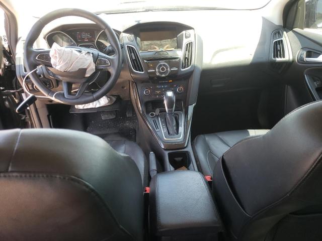 Photo 8 from auction – 2015 FORD FOCUS TITA with VIN 1FADP3N22FL292269