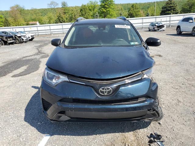 Photo 5 from auction – 2017 TOYOTA RAV4 LE with VIN JTMBFREV9HJ110700