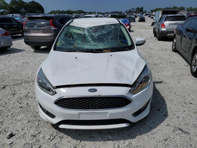 Photo 5 from auction – 2015 FORD FOCUS SE with VIN 1FADP3K27FL345133