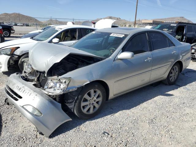 TOYOTA CAMRY LE 2004 with VIN 4T1BF30K54U571763 - Photo from auction