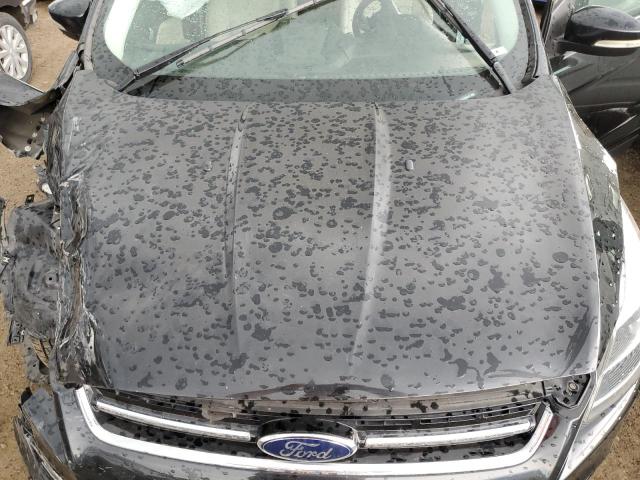 Photo 12 from auction – 2014 FORD ESCAPE TIT with VIN 1FMCU9J9XEUB63141