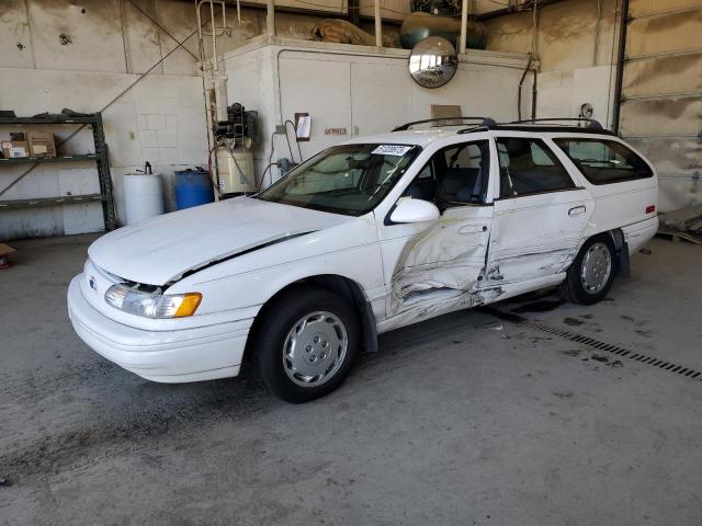 FORD TAURUS GL 1994 with VIN 1FALP5747RG138336 - Photo from auction