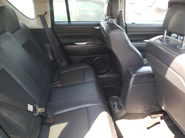 Photo 10 from auction – 2014 JEEP COMPASS LA with VIN 1C4NJDEB9ED576948