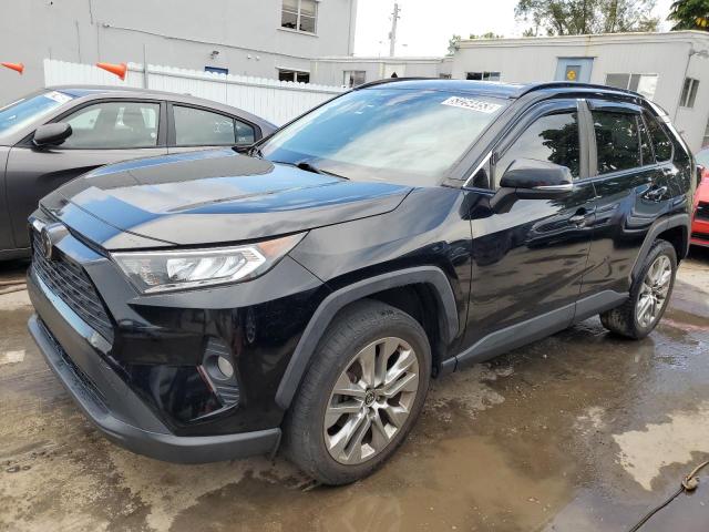 TOYOTA RAV4 XLE P 2020 with VIN JTMC1RFV4LD520457 - Photo from auction