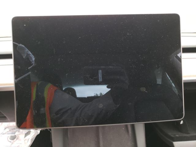 Photo 9 from auction – 2021 TESLA MODEL 3 with VIN 5YJ3E1EA1MF079076