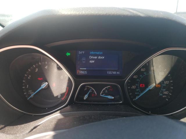 Foto 9 de la subasta – 2014 FORD FOCUS SE con VIN 1FADP3K27EL462872