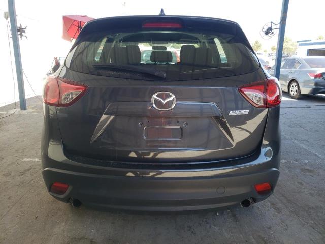 Photo 6 from auction – 2014 MAZDA CX-5 SPORT with VIN JM3KE2BEXE0335201