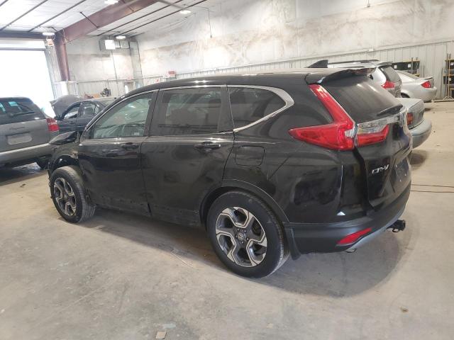 Photo 2 from auction – 2018 HONDA CR-V EX with VIN 7FARW1H50JE024091