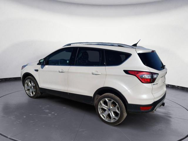 Photo 2 from auction – 2018 FORD ESCAPE TIT with VIN 1FMCU9J95JUC58894